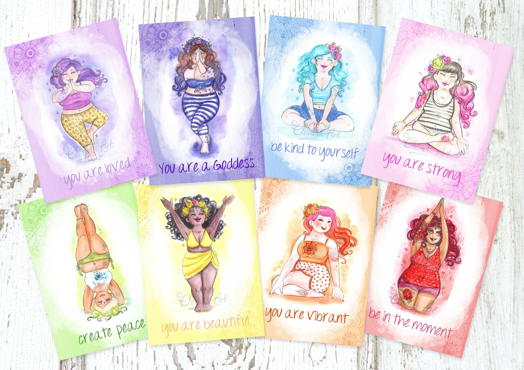 A set of 8 postcards featurings Charlottes paintings of women doing yoga, each one is a different colour of the rainbow.